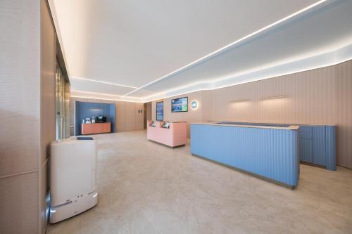Un lugar para sentarse en Hanting Hotel Beijing Zhongguancun Changchun Bridge Subway Station