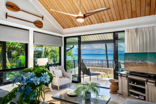 an open living room with a view of the ocean at Kahana Village 32 · KHV 32 Direct Oceanfront Views Remodeled 2BD in Kahana