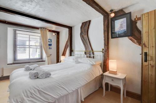 Voodi või voodid majutusasutuse Sea Reach toas