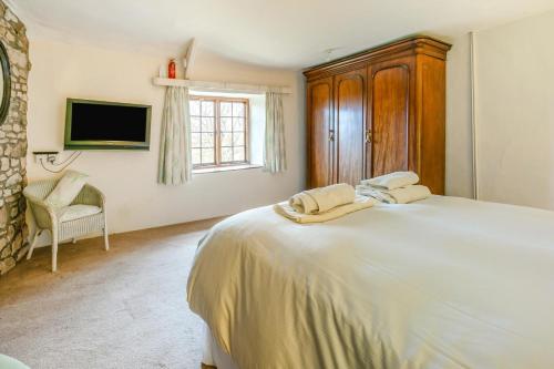 Katil atau katil-katil dalam bilik di Boundstone Farmhouse