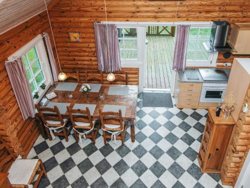 an overhead view of a dining room with a table and chairs at 6 person holiday home in Hovborg in Hovborg