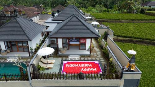 a model of a house with a swimming pool at Mahayani Ubud Villa in Tegalalang