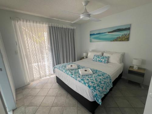 Ένα ή περισσότερα κρεβάτια σε δωμάτιο στο Excellsior Apartments