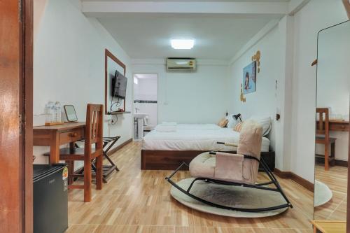 Cama o camas de una habitación en Baan inta hostel - บ้านอินตาโฮสเทล