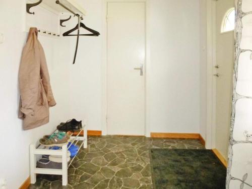 a room with a hallway with a closet and a door at 4 person holiday home in Brålanda-By Traum in Brålanda