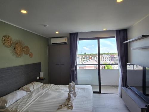 En eller flere senge i et værelse på Urban Tide Studio T3 -626