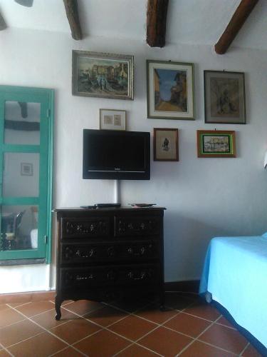 Μια τηλεόραση ή/και κέντρο ψυχαγωγίας στο Relaxing Paradise Chez Nicolini