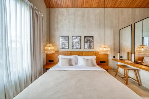 Ένα ή περισσότερα κρεβάτια σε δωμάτιο στο New Luxury Arrecife Villas