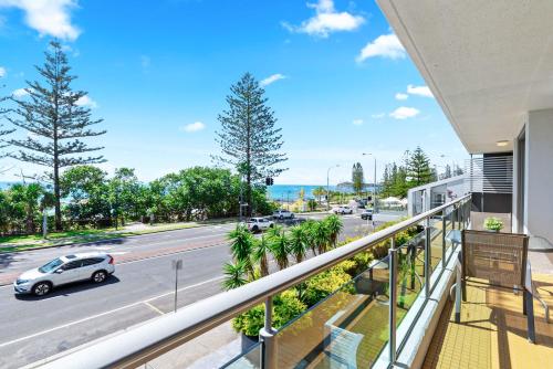 a balcony with a view of a street at Northwind Beachfront Apartments in Mooloolaba