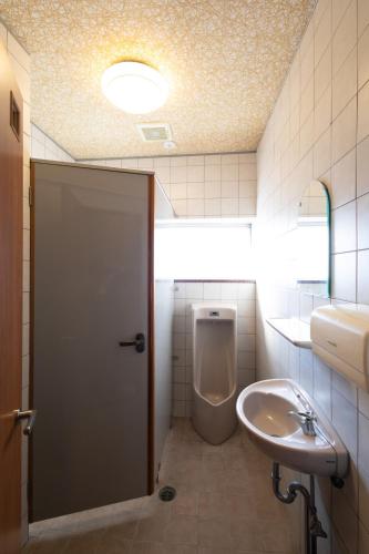 a bathroom with a toilet and a sink at Fukunosumika - Vacation STAY 79527v in Nanto