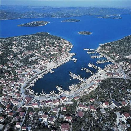 an aerial view of a harbor with boats in the water at Apartments Leut in Jezera