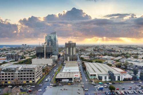 an aerial view of a city with traffic at Oakwood Premier Melbourne in Melbourne