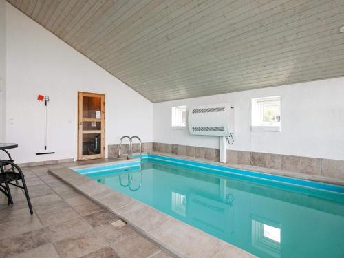 a swimming pool in a house at 4 star holiday home in Skals in Skals