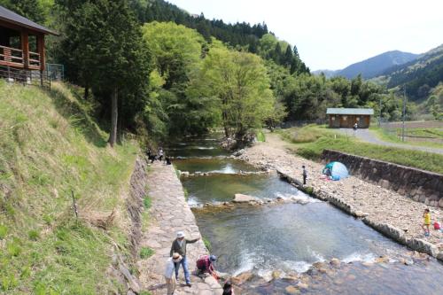 a group of people standing next to a river at Tom sawyer adventuer village - Vacation STAY 55798v in Mimasaka