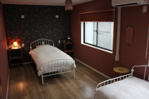 Postel nebo postele na pokoji v ubytování Dragon Bay Villa - Vacation STAY 12533v