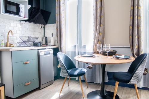 Η κουζίνα ή μικρή κουζίνα στο Appartement tout confort