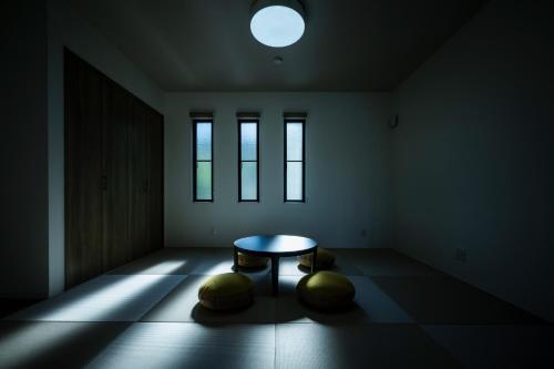 a room with a table and two balls on the floor at Seaside Villa N - Vacation STAY 21991v in Mitsugoe