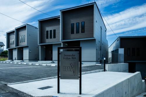 a building with a sign in front of it at Seaside Villa N - Vacation STAY 21988v in Mitsugoe