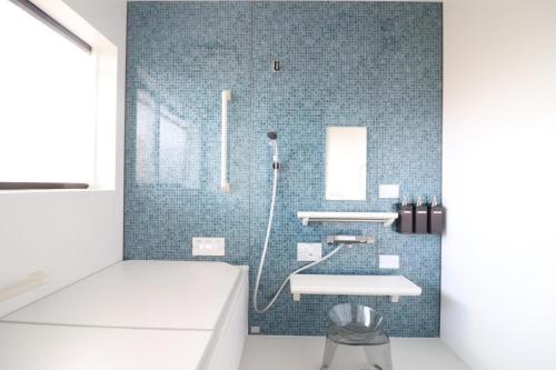 a bathroom with a sink and a shower at Dekopin House - Vacation STAY 18550 in Hanamaki
