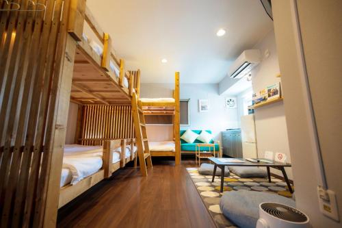 Ένα ή περισσότερα κρεβάτια σε δωμάτιο στο Hyuga Surf Camp201 - Vacation STAY 31873v