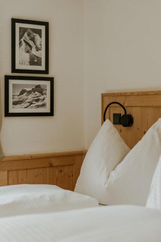 Postel nebo postele na pokoji v ubytování Almrausch BoutiqueChalet TOP 1