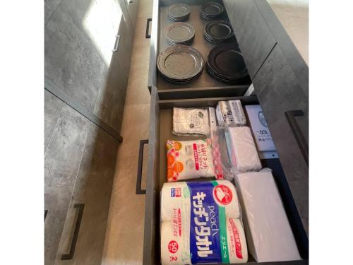 an open refrigerator with some food on a shelf at Shirahama Village - Vacation STAY 52778v in Minamiboso
