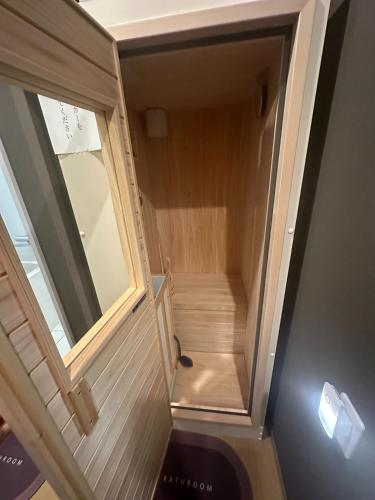 a stairwell in a tiny house with a window at Minpaku Dorihu - Vacation STAY 18675 in Taiki