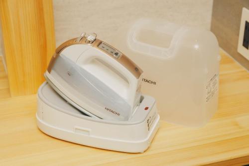 a white toaster sitting on top of a table at moon river - Vacation STAY 53517v in Hatsukaichi