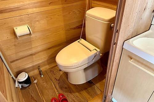 a small bathroom with a toilet and a sink at Camping-style accommodation: Yumeraku - Vacation STAY 65716v in Ema