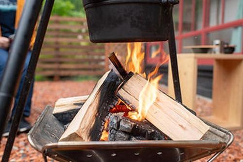 a grill with a fire inside of it at Camping-style accommodation: Yumeraku - Vacation STAY 65716v in Ema