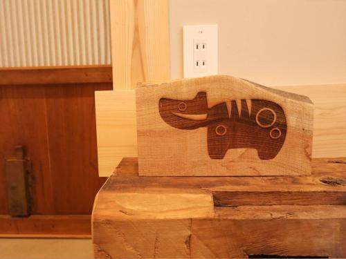 a wooden block with a picture of a horse on it at A-UN INN - Vacation STAY 84863v in Aizuwakamatsu