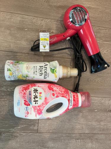 a toothbrush and a hair dryer on a wooden floor at VILLA PRECI - Vacation STAY 85974v in Teruma