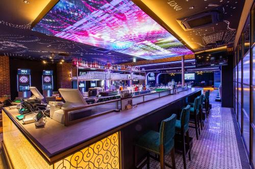 a bar in a nightclub with neon lights at Shinagawa Prince Hotel East Tower in Tokyo