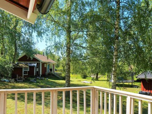 Zahrada ubytování 4 person holiday home in AXVALL