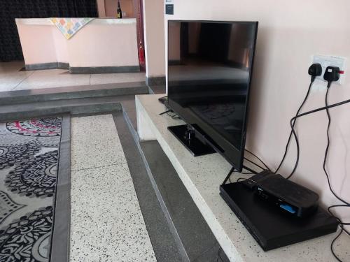 TV a/nebo společenská místnost v ubytování Le Tai Village Homestay