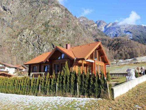 a small house in front of a mountain at Chalet in Ötztal near Ötz-Hochötz Ski Resort in Umhausen