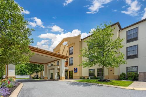 a rendering of a hotel with a parking lot at Comfort Suites near Penn State - State College, PA in State College