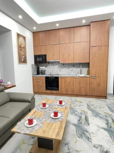 a living room with a couch and a coffee table at PENZION Hamburk in Beroun