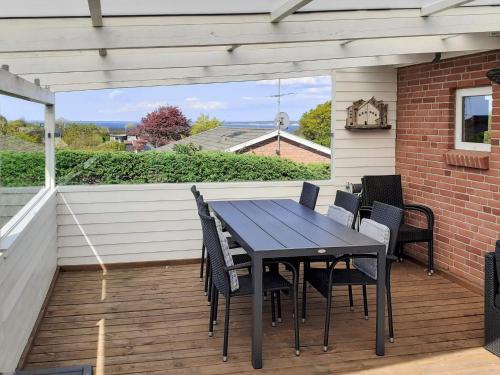 Μπαλκόνι ή βεράντα στο 10 person holiday home in Roslev