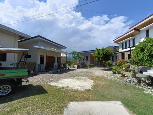a view of the front yard of a house at Villa Kendra in Moalboal