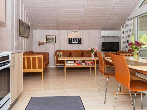 a living room with a couch and a table at Family Retreat in Hovborg - By Traum Ferienwohnungen in Hovborg