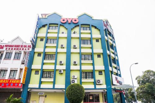 a building with an oo sign on top of it at Dancenter Seremban Near Gateway Mall Formerly Sri Mutiara Hotel in Seremban