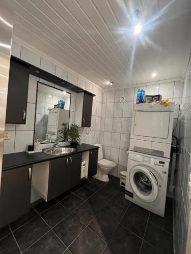 Ένα μπάνιο στο Tromsø City Apartment