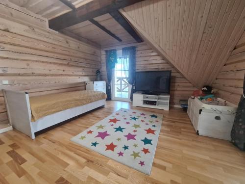 Postel nebo postele na pokoji v ubytování Šliožių dvaras