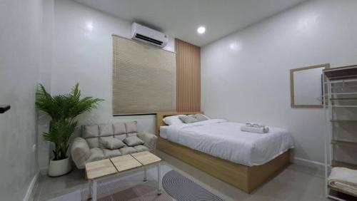 Katil atau katil-katil dalam bilik di บ้านใจฟู