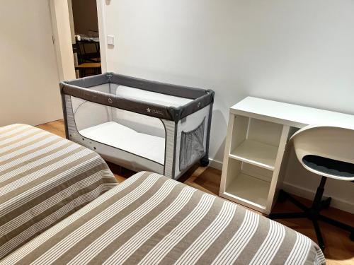 Katil atau katil-katil dalam bilik di Apartamento Xogo da Ola En el camino De Santiago