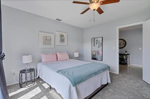 a bedroom with a bed and a ceiling fan at GRH14276 - Charlotte Harbor Area - 3 Bed 2 Baths Villa in Punta Gorda Isles