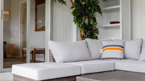 a white couch sitting in a living room at GRH11506 - Charlotte Harbor Area - 2 Bed 2 Baths Villa in Punta Gorda Isles