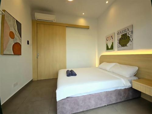 Letto o letti in una camera di Mahkota Superb View Apartment near A’Famosa & Jonker