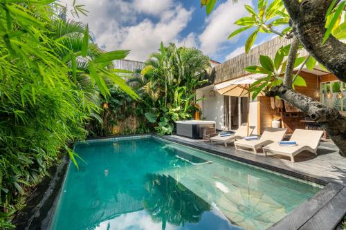 an image of a swimming pool in a villa at Villa Shakti Canggu in Canggu